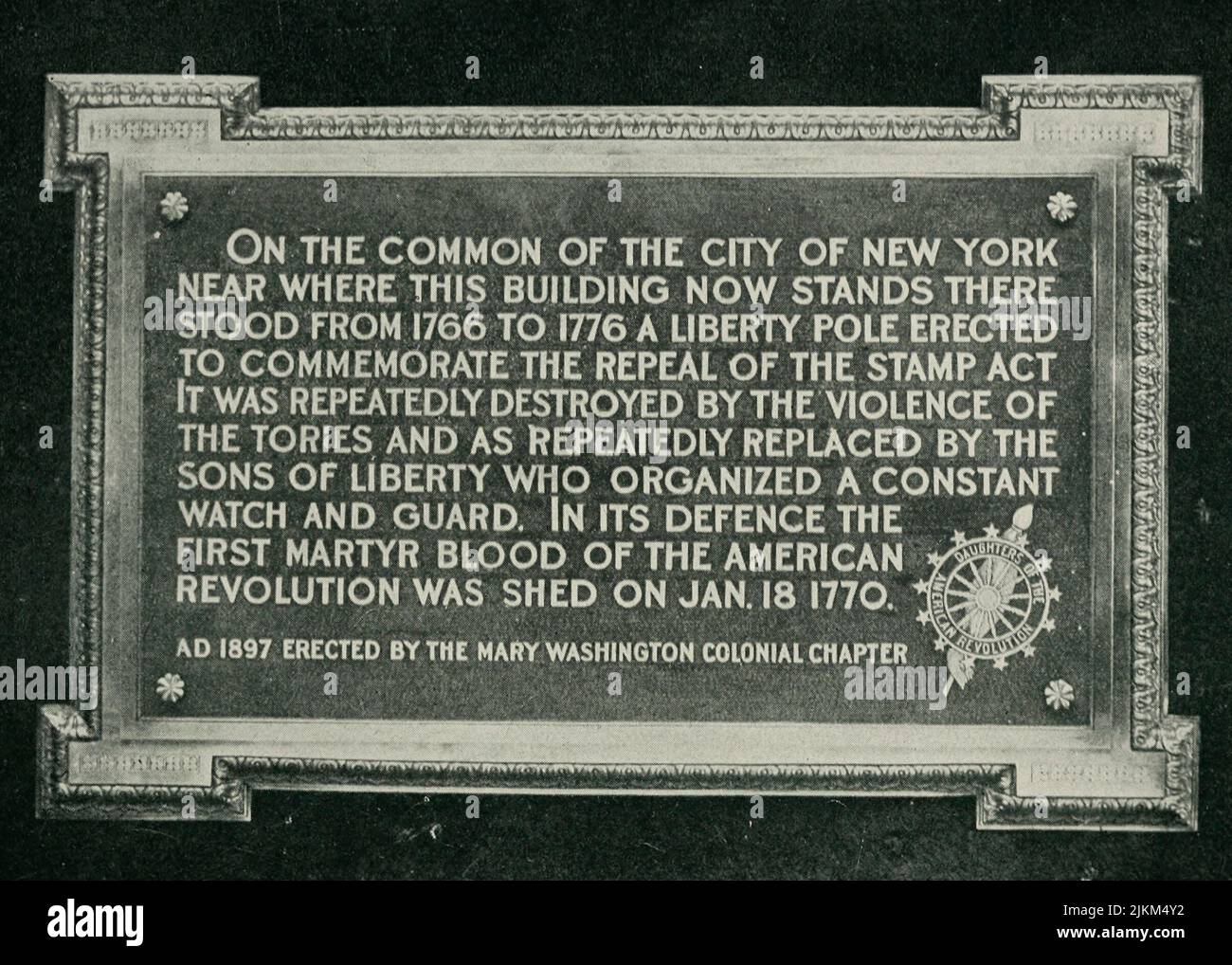 The Liberty Pole 1766-1776 - Handsome bronze tablet erected in the old Post Office Building in 1897, where it originally stood prior to the Declaration of Independence. Stock Photo