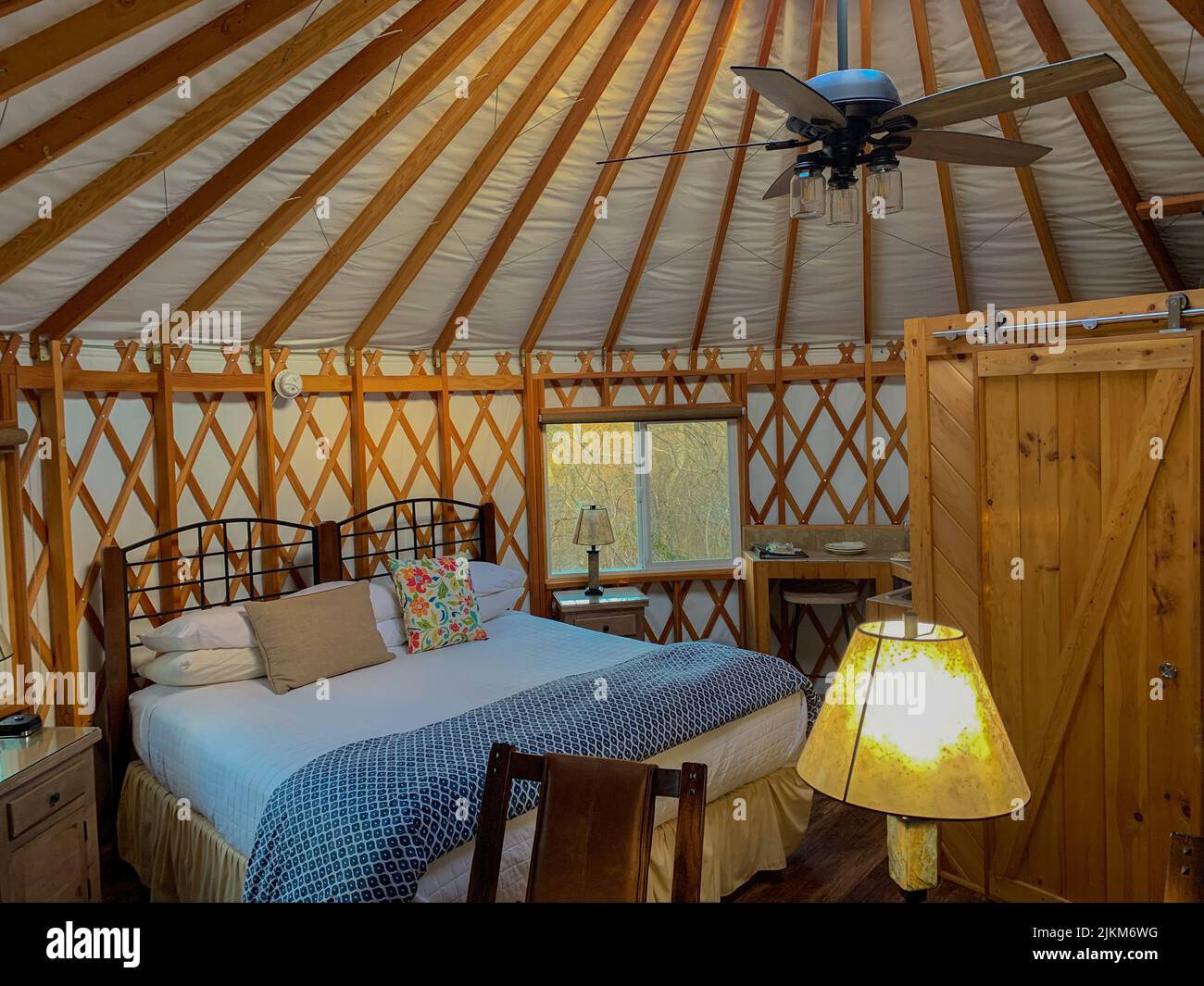 An interior of a beautiful bedroom in a modern yurt Stock Photo