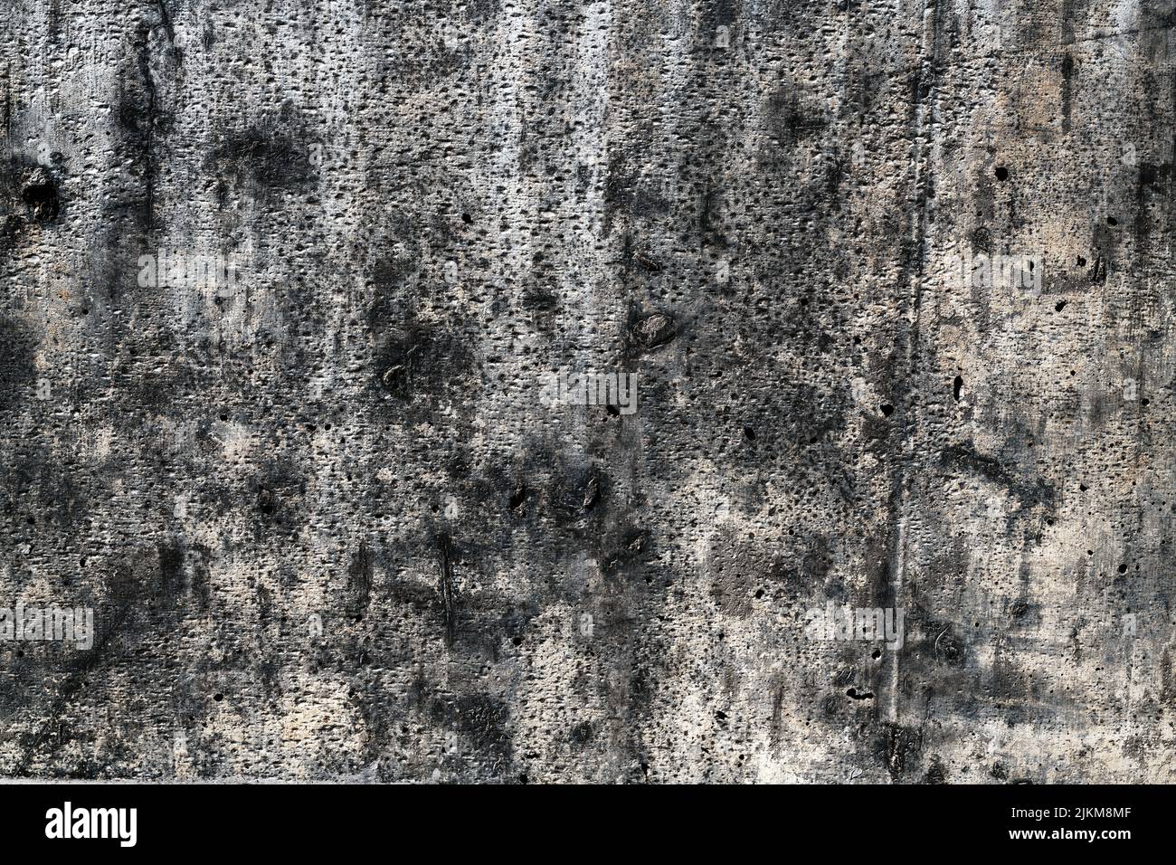 Worn concrete wall surface as grunge texture, graphic design element Stock Photo