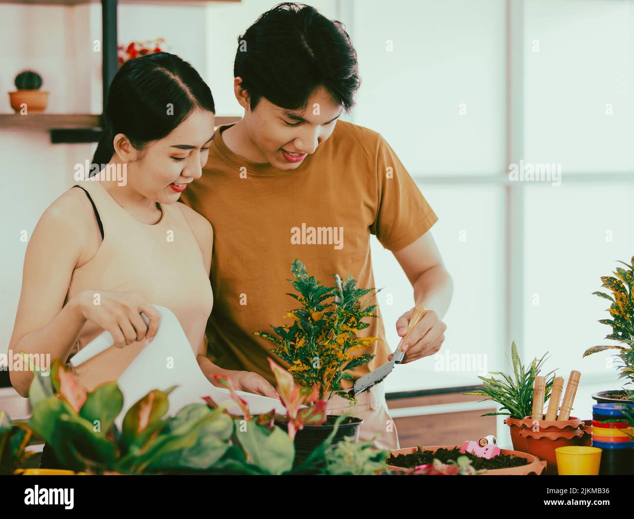 Young happy asian couple smiling hi-res stock photography and images ...