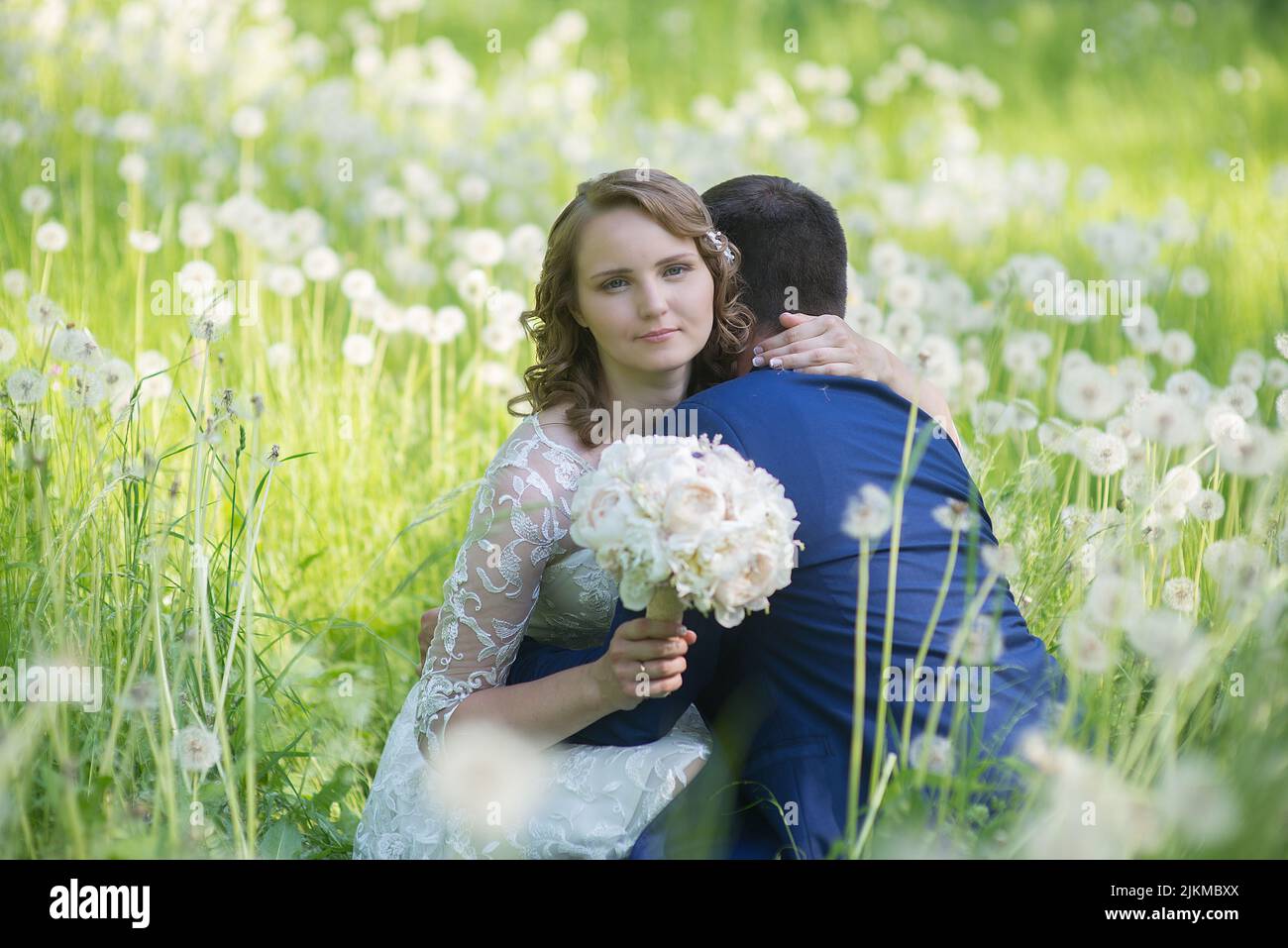 Woman man hug sitting hi-res stock photography and images - Alamy