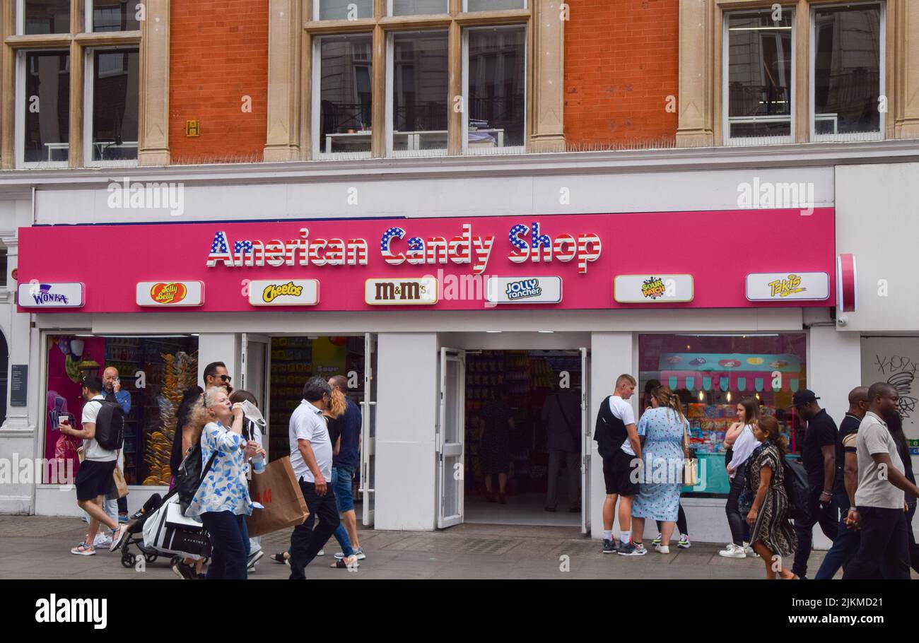 Pedestrians pass by a candy store on Oxford Street. Concern is growing over the many so-called 'American candy shops' which have proliferated around central London. Stock Photo