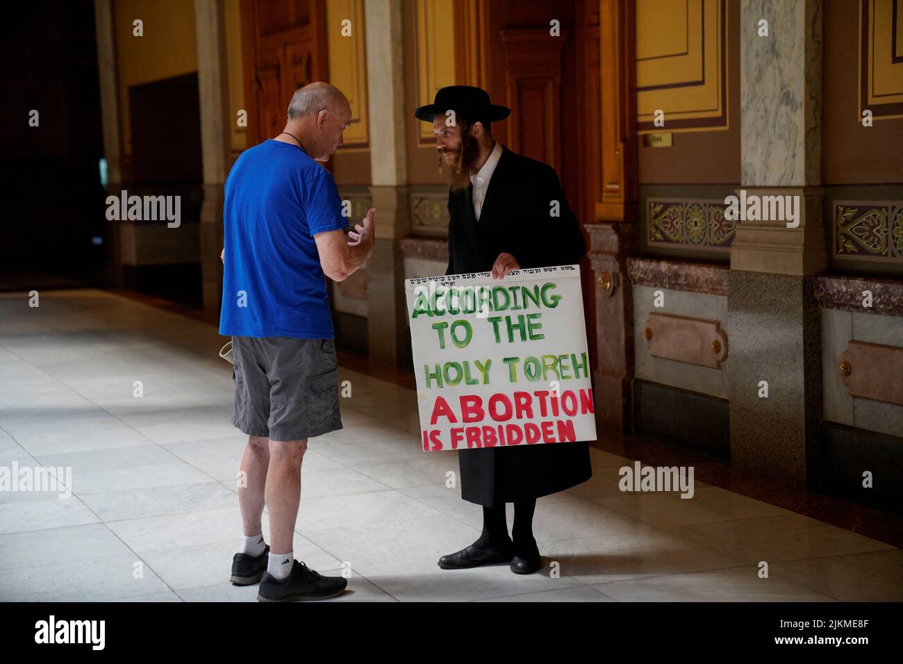 Anti-abortion rights demonstrators speak inside the Indiana Statehouse during a special session to debate banning abortion in Indianapolis, Indiana, U.S. August 2, 2022.  REUTERS/Cheney Orr Stock Photo