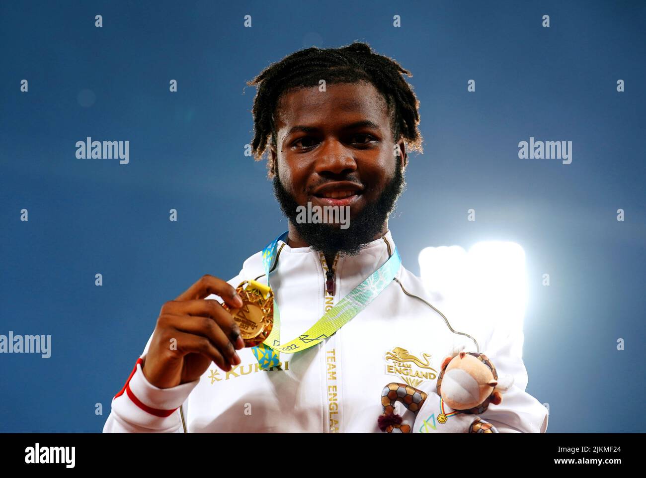 England's Emmanuel Temitayo OyinboCoker celebrates with his gold medal