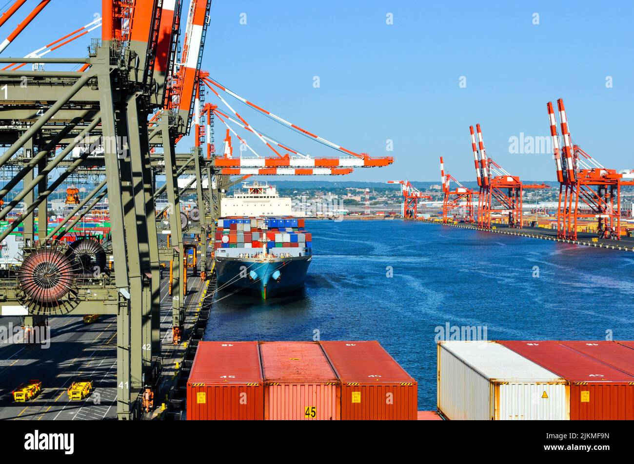 Container ship in port at container terminal. Ships of container ships ...