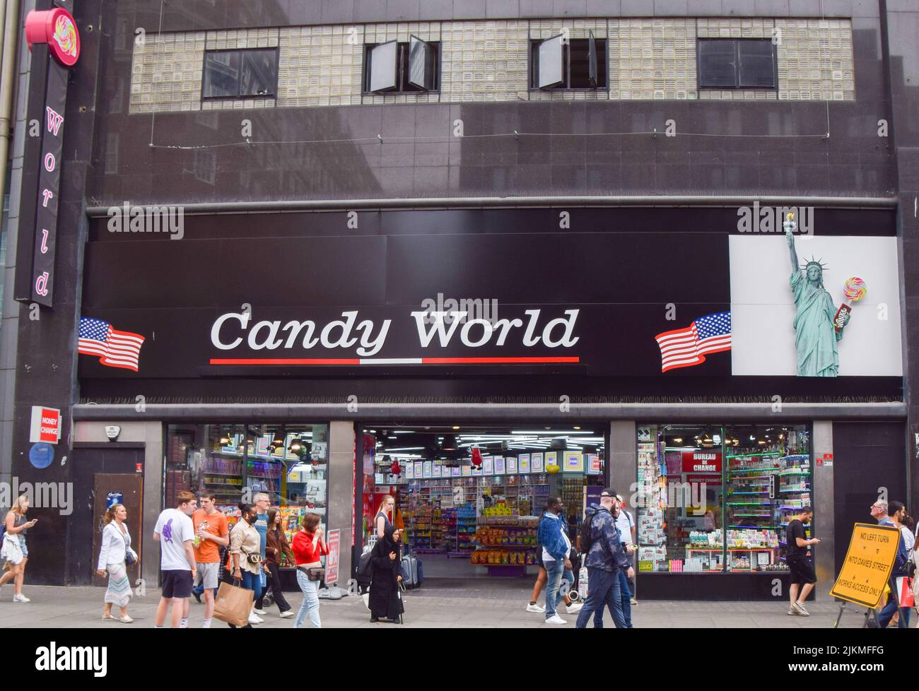 London, UK. 2nd Aug, 2022. Pedestrians pass by Candy World, which has taken over the site of the former flagship HMV store on Oxford Street. Concern is growing over the many so-called ''American candy shops'' which have proliferated around central London. (Credit Image: © Vuk Valcic/SOPA Images via ZUMA Press Wire) Stock Photo