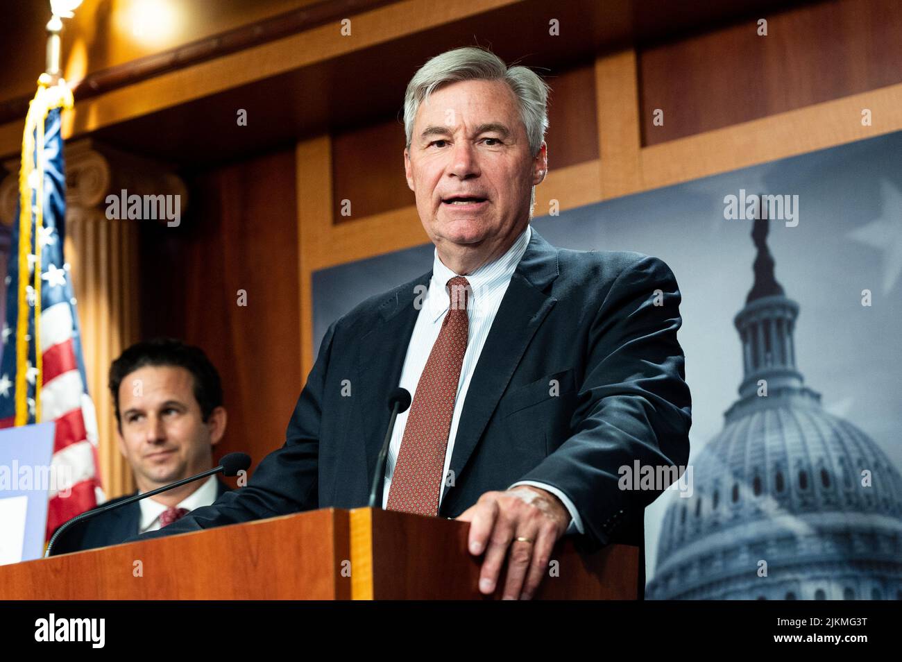 U.S. Senator Sheldon Whitehouse (D-RI) speaking with reporters at a ...