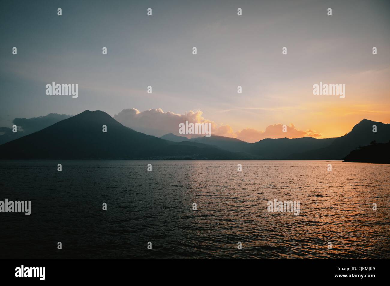 A beautiful view of a lake Atitlan in Guatemala at sunset Stock Photo