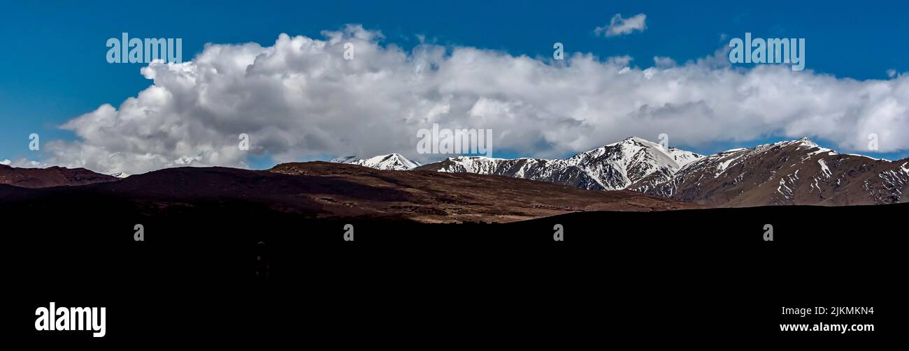 A beautiful panorama of High Atlas Mountains with snow on the top in Morocco Stock Photo