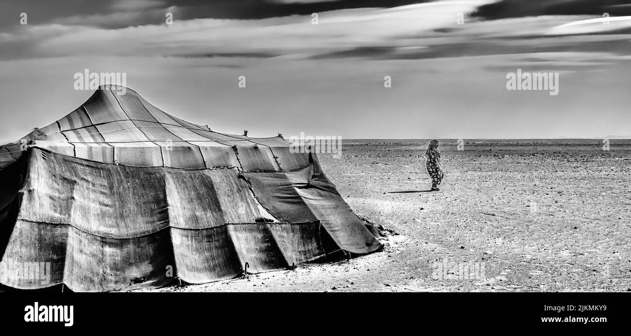 A grayscale of a tent in the Sahara Desert in Morocco Stock Photo