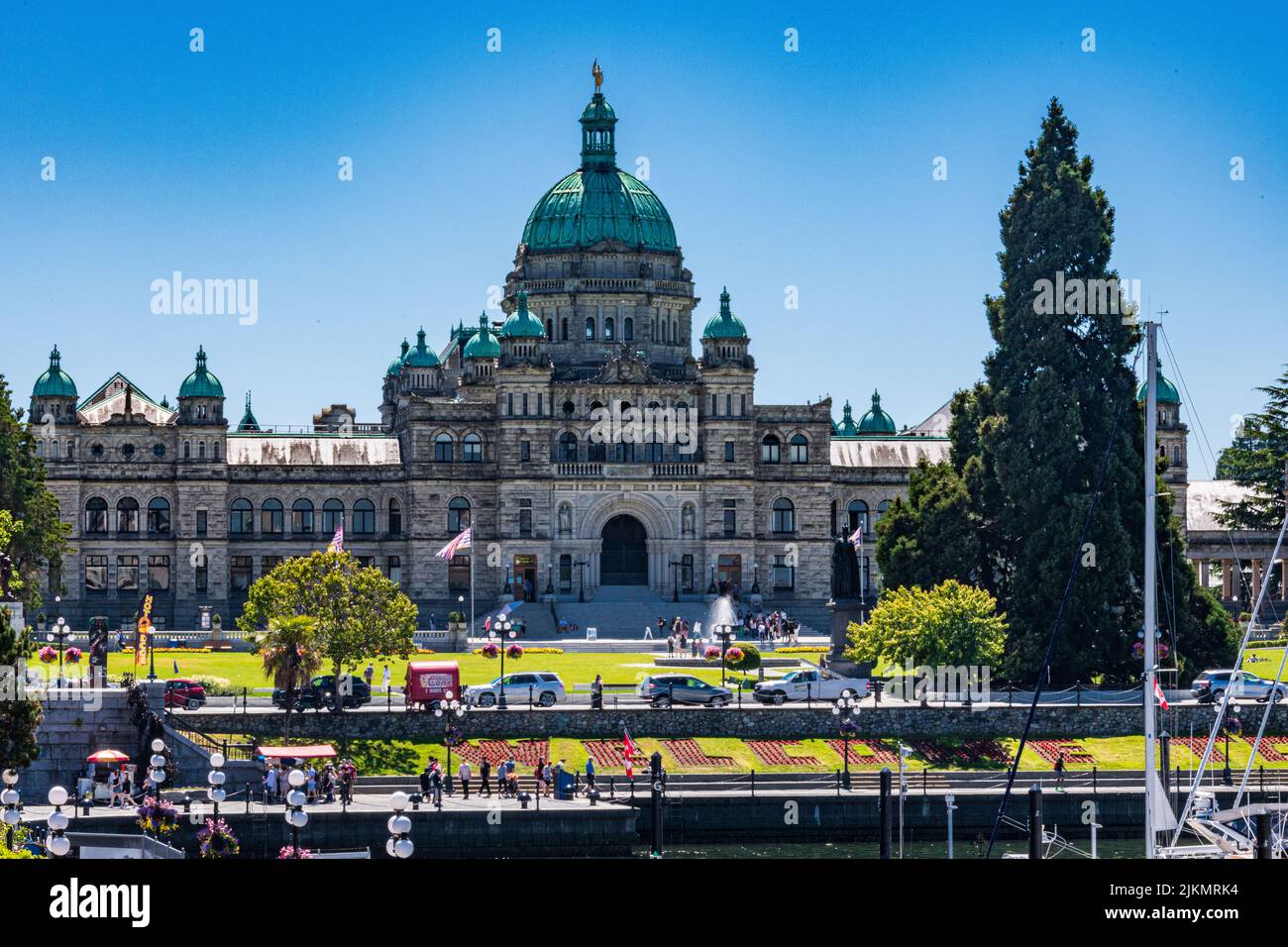 Welcome Sign in flowers in front of the British Columbia parliment Building in Victoria Canada Stock Photo