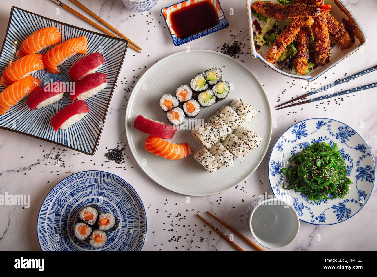 Varied sushi menu and prawn tempura. Stock Photo