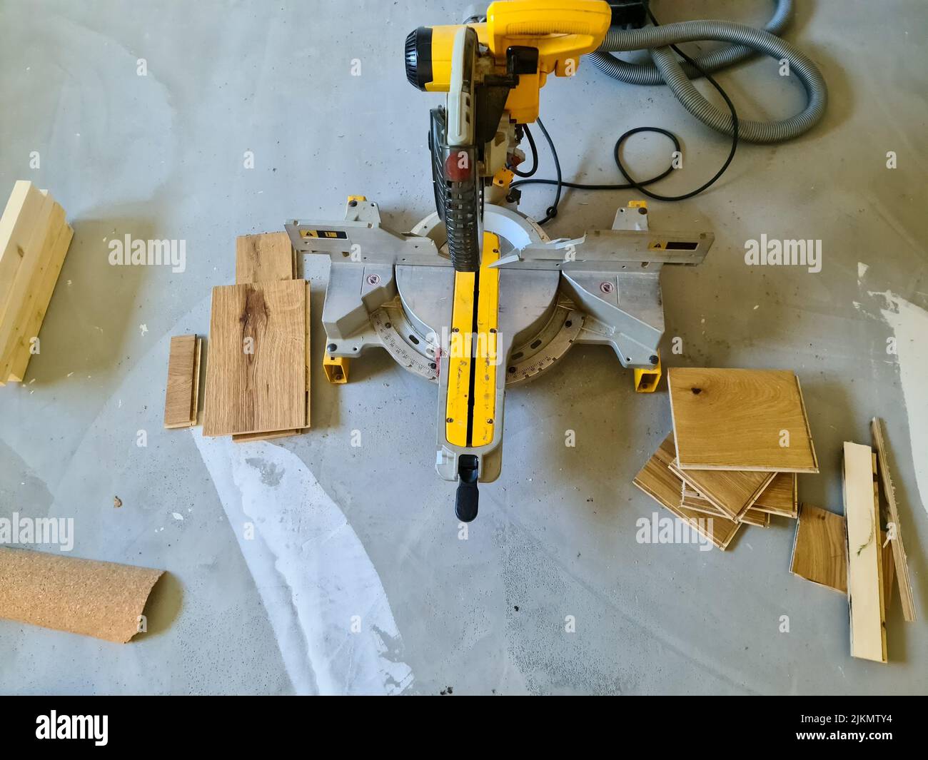 A parquet floor made of wood while it is being freshly installed Stock