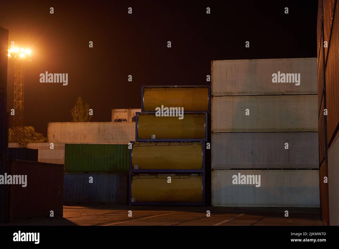 operation of container terminal at night. Unloading container ship at ...