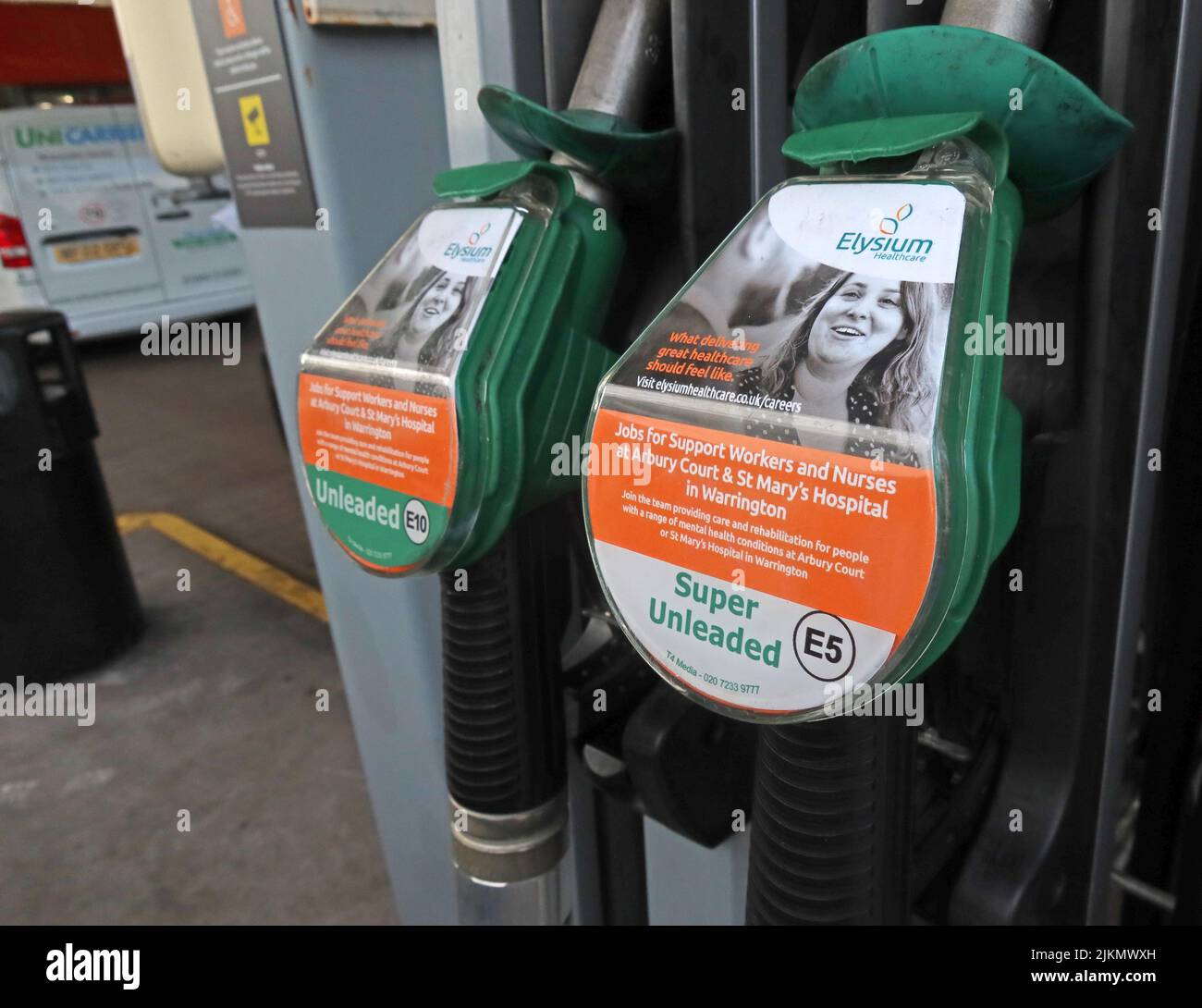 Petrol, Diesel fuel pumps, unleaded, super-unleaded,, at filling station, Sainsburys Warrington, town centre, Cheshire, England, UK Stock Photo