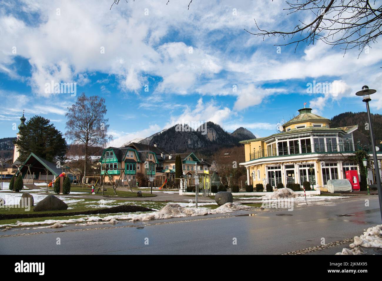 The buildings in Saint Gilgen on a blue cloudy sky background Stock Photo