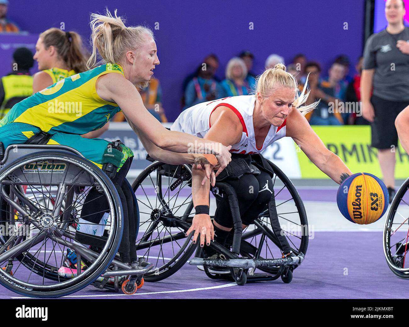 Birmingham, UK. 02nd Aug, 2022. Canada's Kady Dandeneau, right, is defended by Australia's Amber Merritt in 3 x 3 wheelchair basketball action at the Commonwealth Games in Birmingham, England on Tuesday, Aug. 2, 2022. Canada beat Australia 14-5 to win gold. Credit: The Canadian Press/Alamy Live News Stock Photo