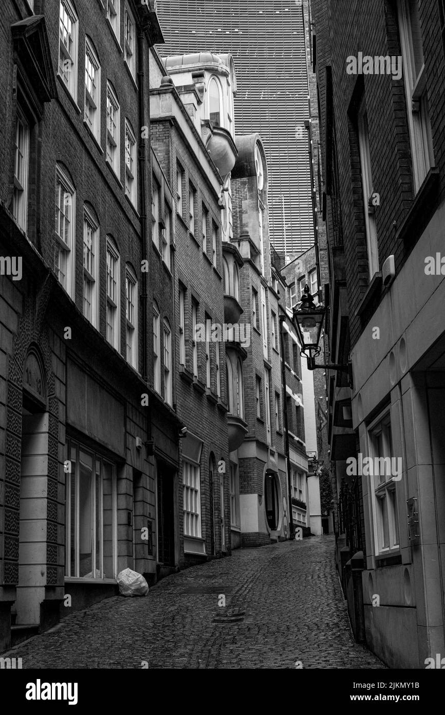 A vertical grayscale shot of residential buildings in London Stock Photo