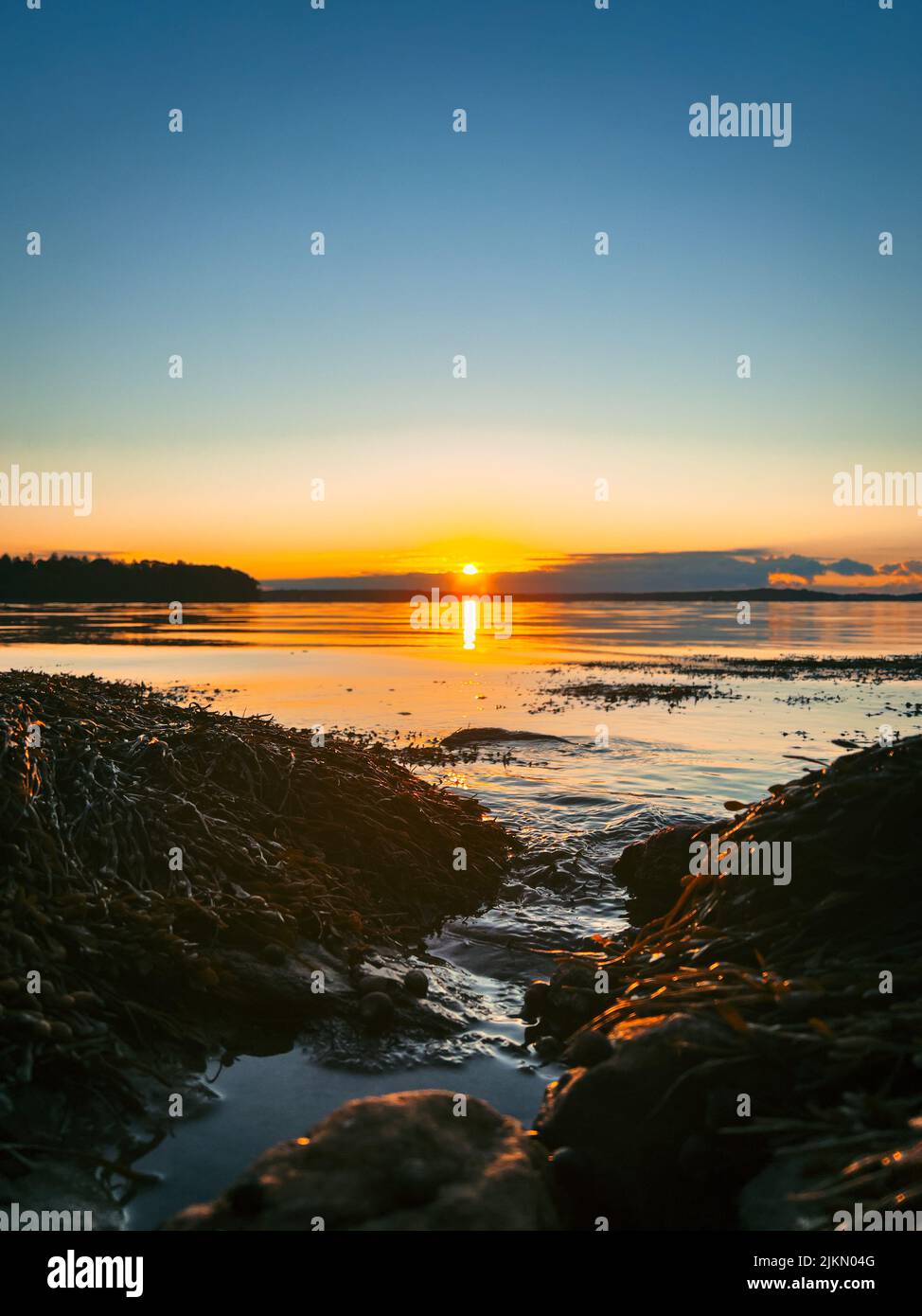 Sunrise over water body hi-res stock photography and images - Alamy