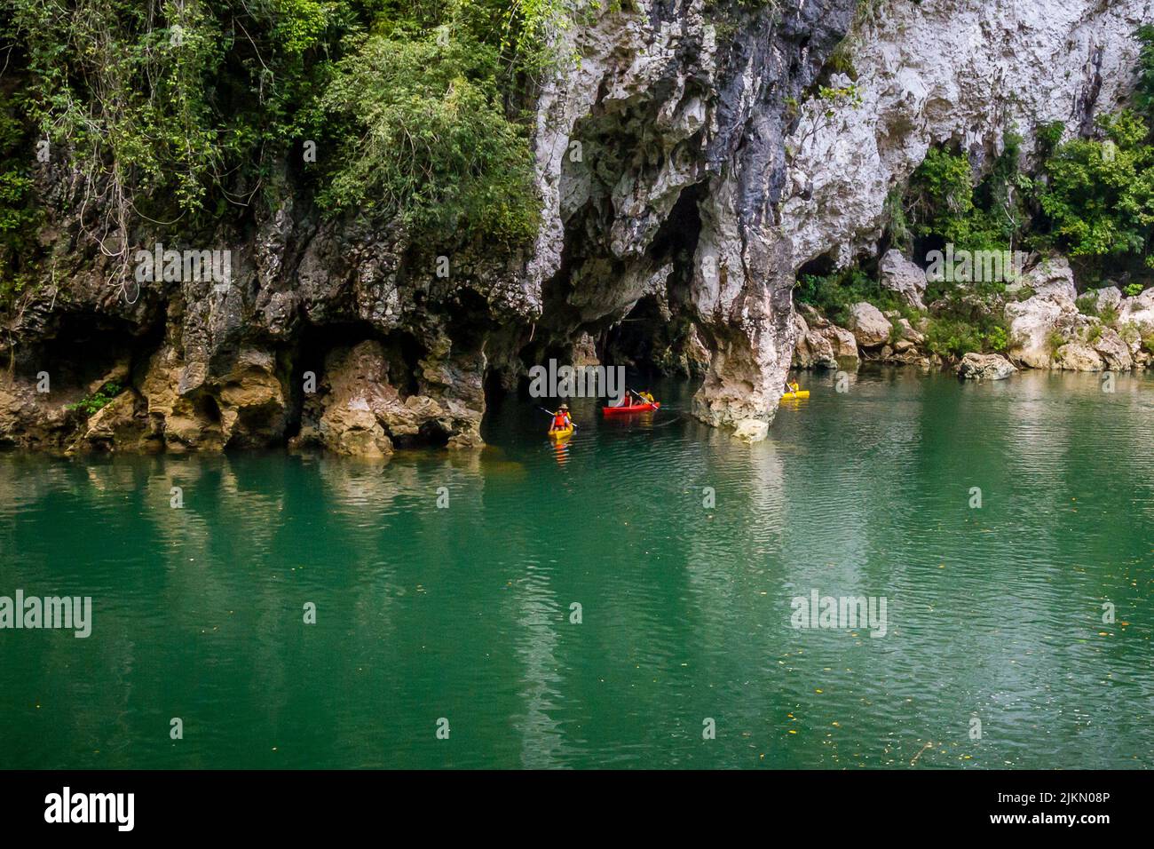 Severa kayakers near the entrance  of the famous Sohoton Cave in Basey, Samar island, Philippines Stock Photo