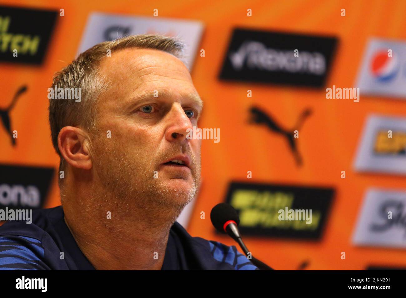 KYIV, UKRAINE - AUGUST 10, 2021: Genk manager John van den Brom attends the press-conference before the UEFA Champions League third qualifying round game against Shakhtar Donetsk in Kyiv Stock Photo