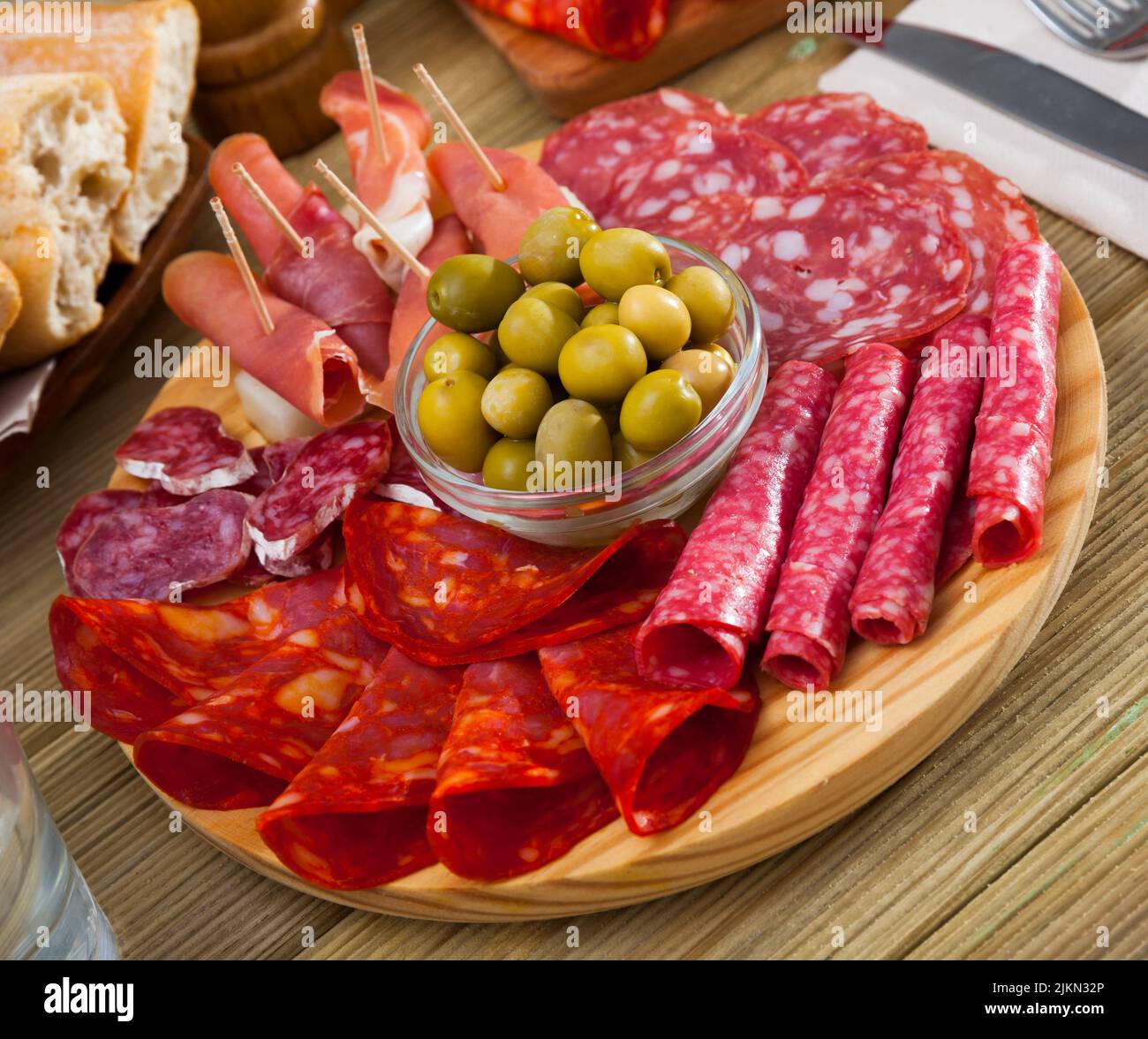 Spanish sausage sliced chorizo, fuet, jamon, salami Stock Photo Alamy