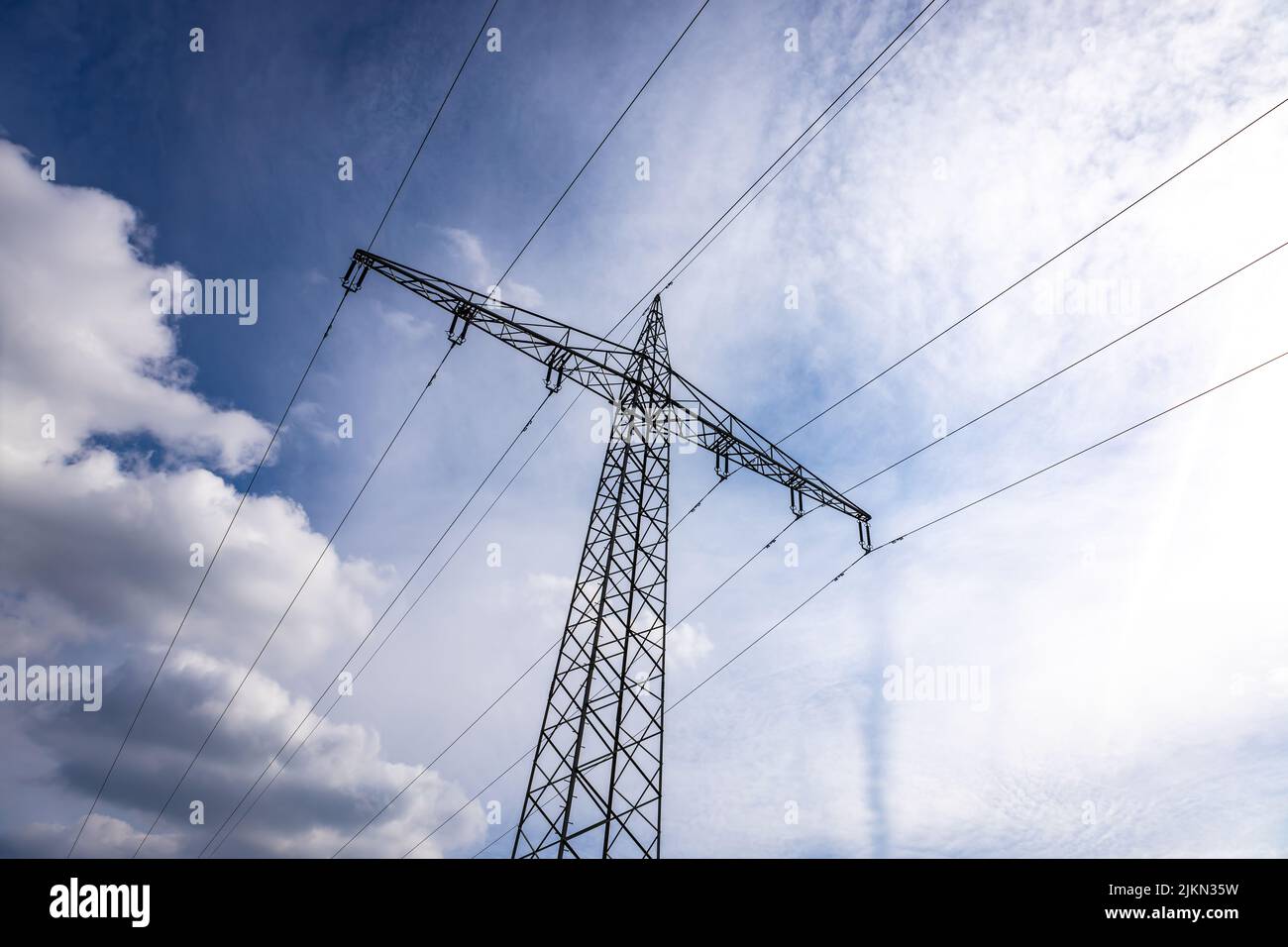 power pole with cloudy sky background Stock Photo - Alamy