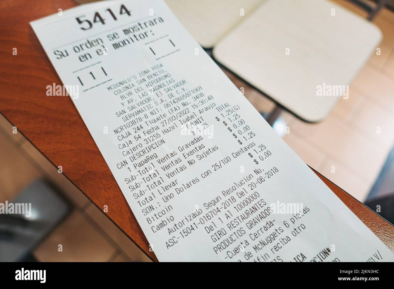 A receipt for food paid for with Bitcoin Lightning Network at McDonald's restaurant in El Salvador Stock Photo