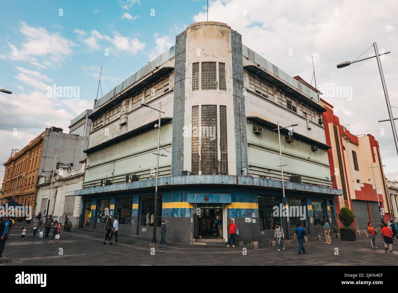 a rundown old art deco style building in San Salvador, El Salvador, on the corner of the central plaza Stock Photo