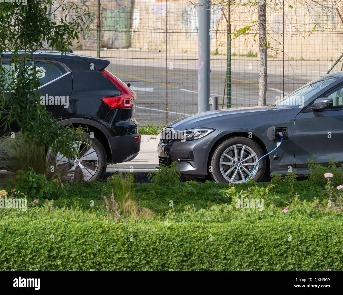 A BMW electric vehicle being charged at the charging station in Lisbon