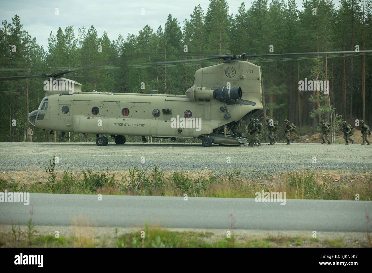 Finnish soldiers assigned to the Kainuu Brigade board a U.S. Army CH-47 Chinook helicopter to begin exercise Ryske 22 at Sodankyla, Finland, July 25, 2022. Ryske 22 is a combined, joint training exercise conducted by the United States, Finland, and Norway to strengthen relations and help build interoperability between partner nations. The 2nd BCT is part of the 101st Airborne Division (Air Assault), under command and control of V Corps, America's forward-deployed corps in Europe, working alongside NATO allies and regional security partners to provide combat-credible forces. (U.S. Army photo by Stock Photo
