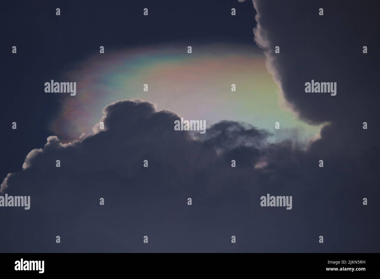 Dark clouds rainbow in hi-res stock photography and images - Alamy