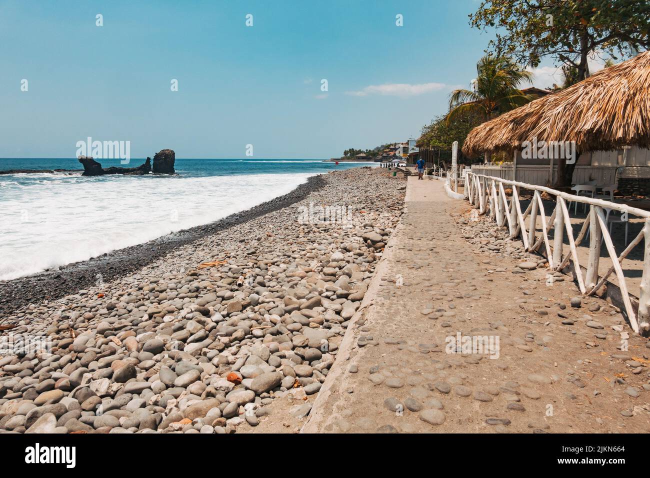 the rocky shores of El Tunco beach on the Pacific Coast of El Salvador Stock Photo