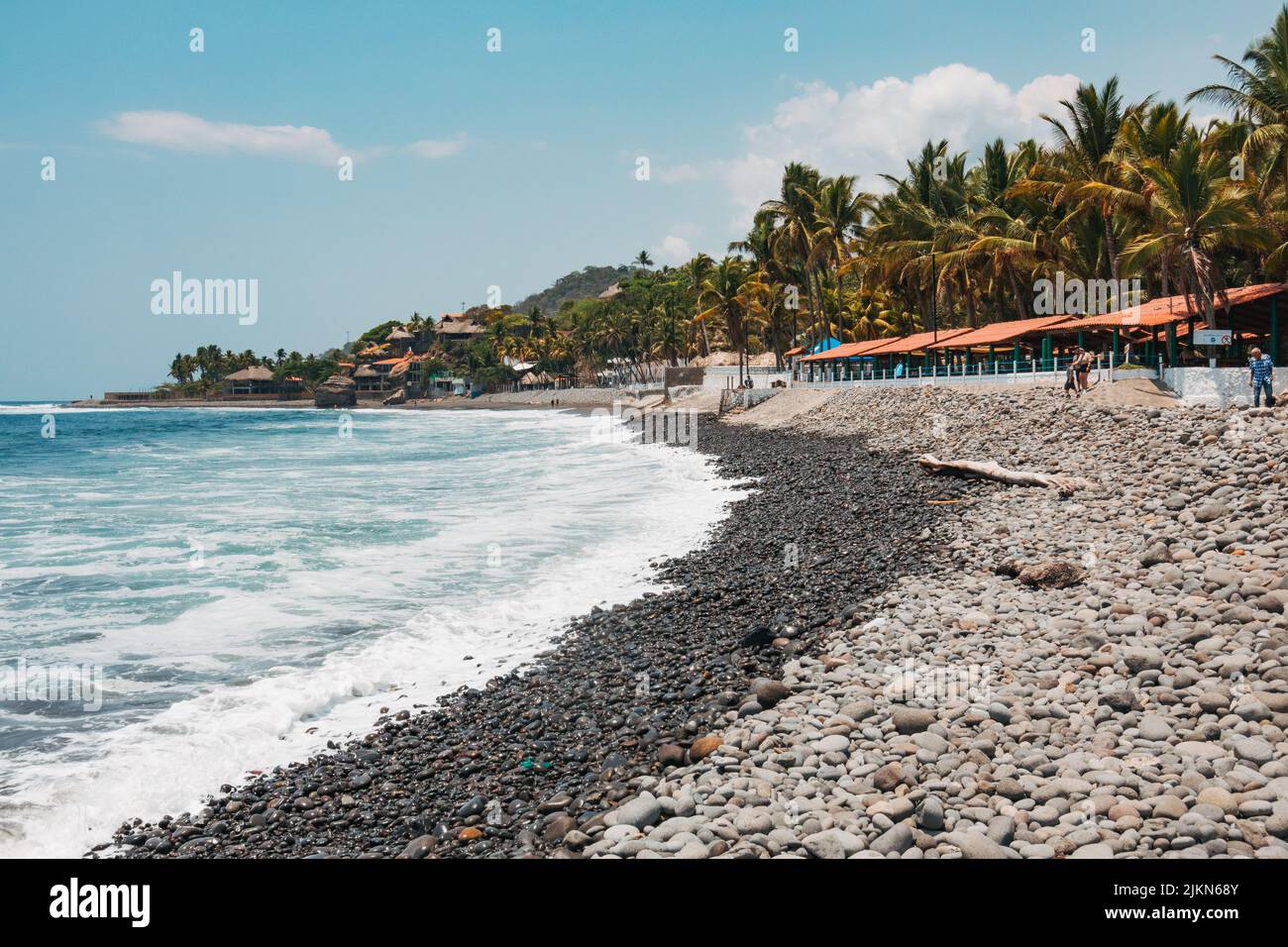 the rocky shores of El Tunco beach on the Pacific Coast of El Salvador Stock Photo