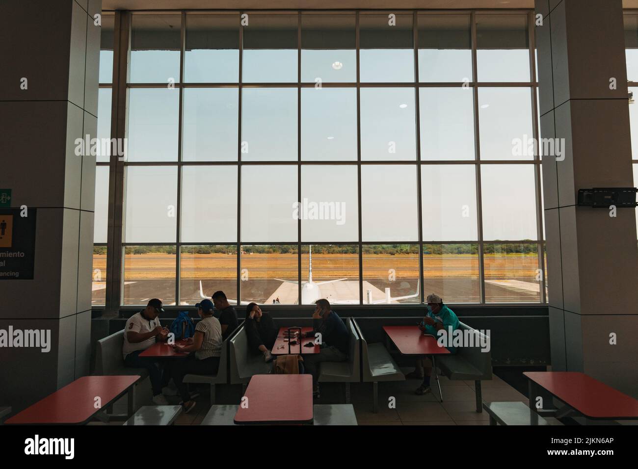 the food hall and observation area inside the El Salvador International Airport terminal, El Salvador Stock Photo