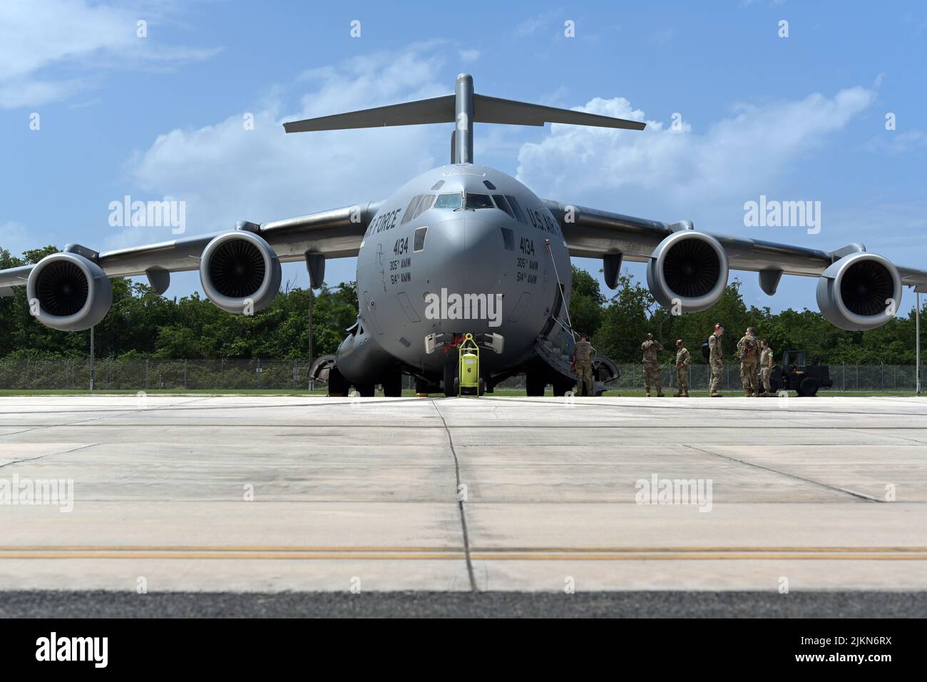A C-17 Globemaster III assigned to the 621st Contingency Response Wing, Joint Base McGuire-Dix-Lakehurst, New Jersey arrives at the 156th Wing airfield at Muñiz Air National Guard Base, Carolina, Puerto Rico, July 18, 2022. The 621st CRW arrived at the 156th Wing to build relationships, conduct the exercise Frog Devil and transfer equipment to the 156th Contingency Response Group necessary for their operational capabilities. (U.S. Air National Guard photo by Master Sgt. Rafael D. Rosa) Stock Photo