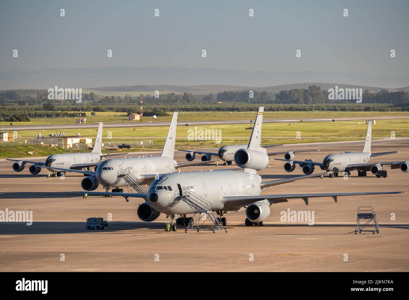 A KC-10, KC-46 and three KC-135s sit on the flight line at Morón Air Base, Spain on Thursday, April 14, 2022. The three airframes represent the entire might of the U.S. Air Force’s refueling arsenal and have a combined 110 years of service between them. (U.S. Air Force photo by Staff Sgt. Nathan Eckert) Stock Photo