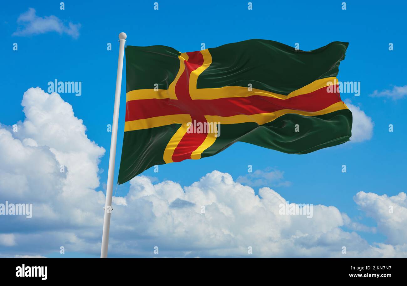 official flag of Nordic cross proposal lithuania at cloudy sky background on sunset, panoramic view. lithuanian travel and patriot concept. copy space Stock Photo