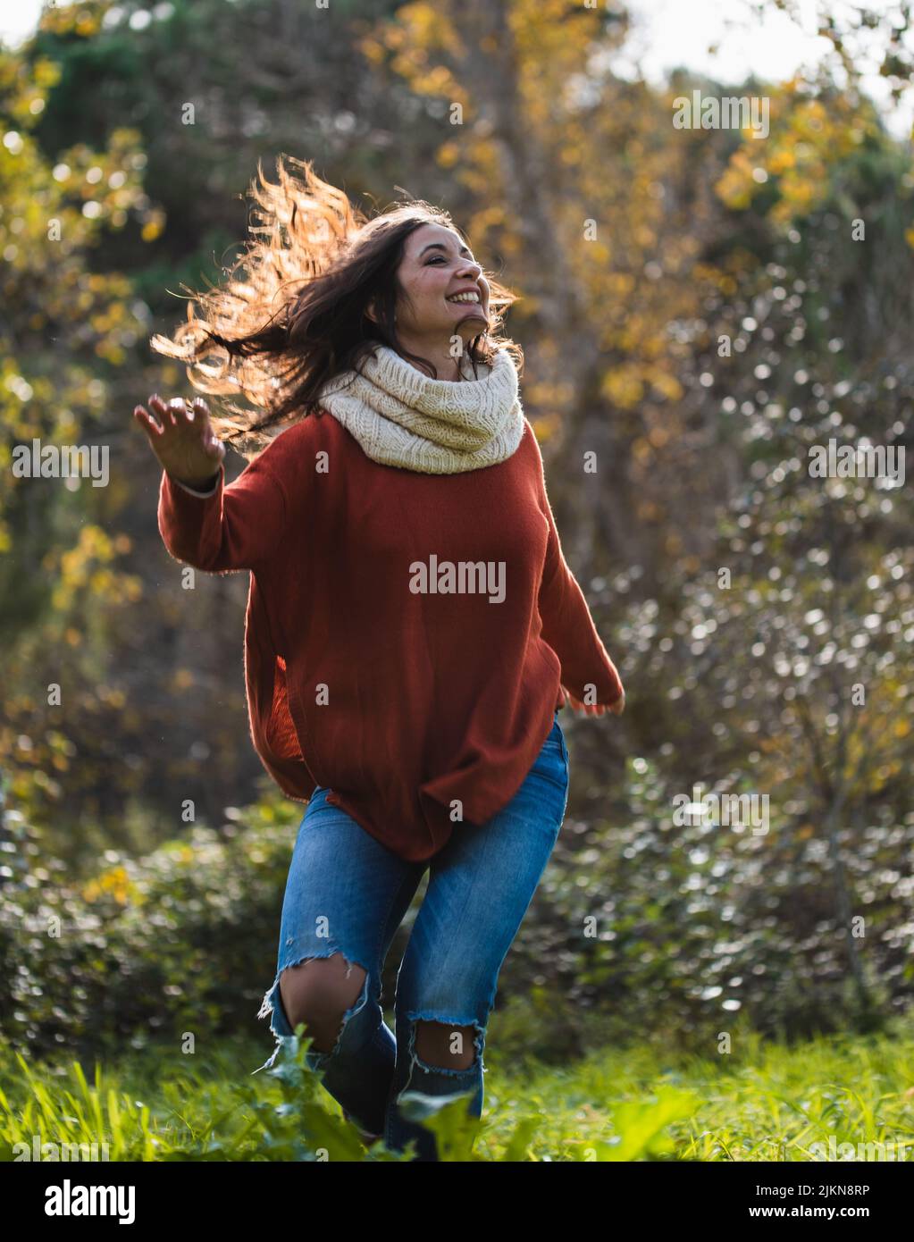 Woman in red sweater on hi-res stock photography and images - Alamy