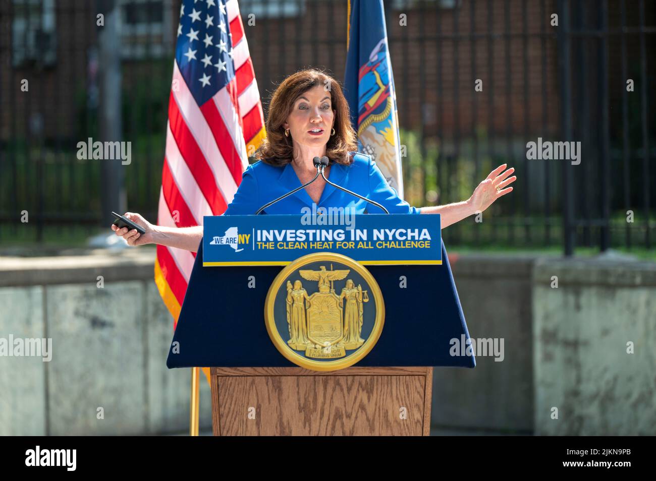 NEW YORK, NEW YORK - AUGUST 02: Governor Kathy Hochul speaks during a joint housing and clean energy-related announcement at Woodside Houses NYCHA complex on August 2, 2022, in Queens Borough of New York City.   Governor Hochul and Mayor Adams announce $70 million initial investment to decarbonize NYCHA buildings as part of clean heat for all challenge. Credit: Ron Adar/Alamy Live News Stock Photo