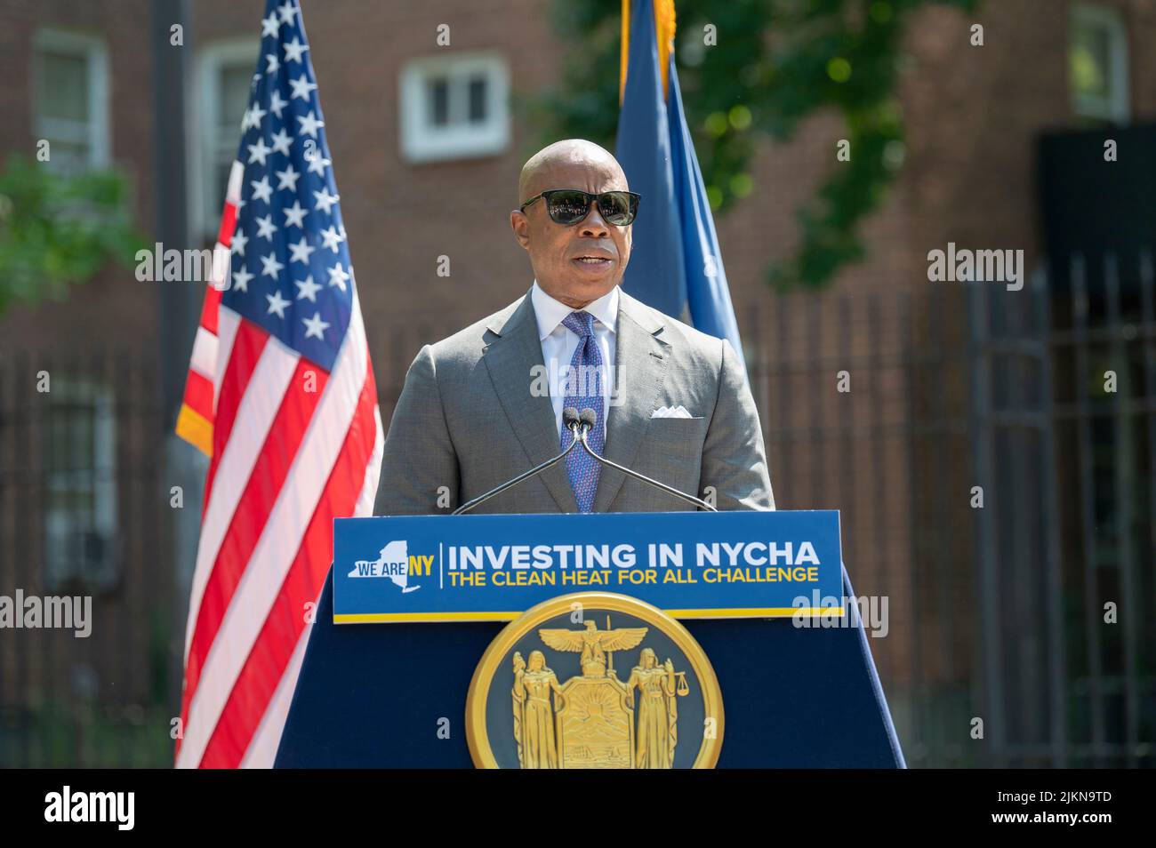 NEW YORK, NEW YORK - AUGUST 02: Mayor Eric Adams speaks during a joint housing and clean energy-related announcement at Woodside Houses NYCHA complex on August 2, 2022, in Queens Borough of New York City.   Governor Hochul and Mayor Adams announce $70 million initial investment to decarbonize NYCHA buildings as part of clean heat for all challenge. Credit: Ron Adar/Alamy Live News Stock Photo