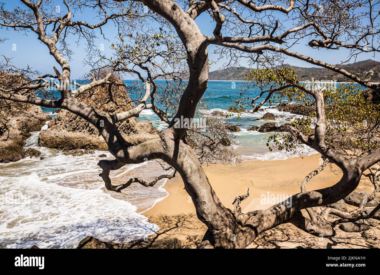 A rocky pocket beach area just north of Playa de los Muertos in Sayulita, Nayarit, Mexico. Stock Photo