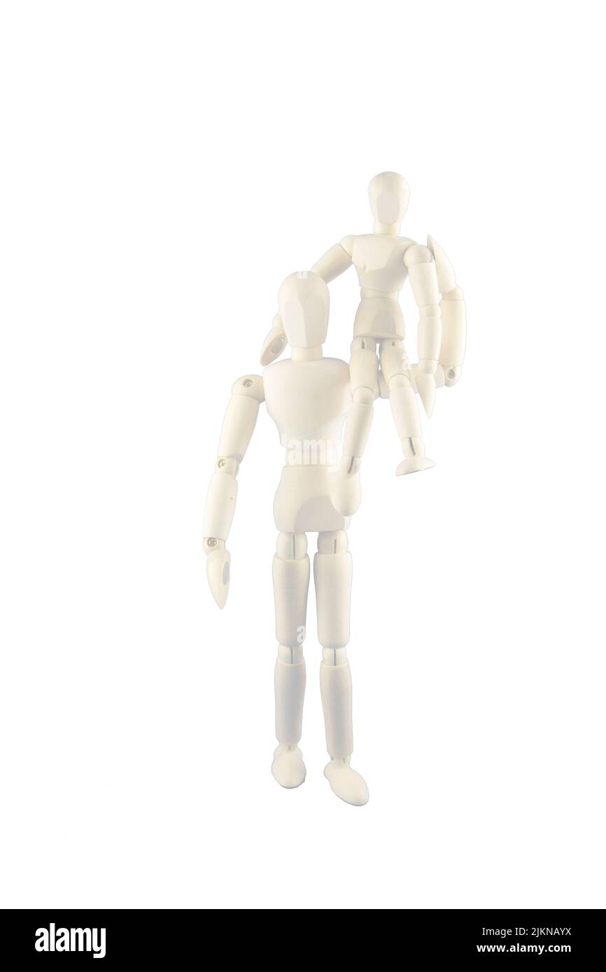 Two handmade wooden mannequins on white background Stock Photo