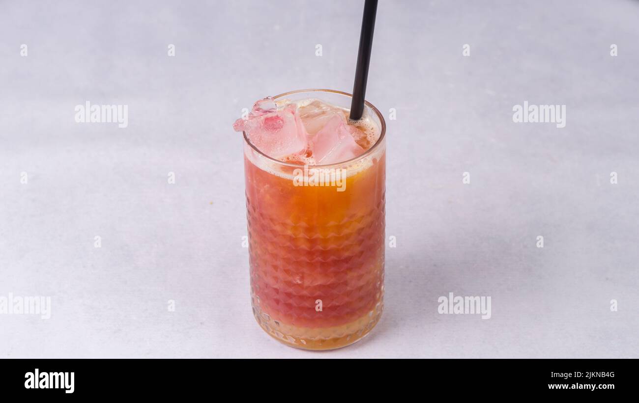 The sour pineapple cocktail with the stick Stock Photo Alamy