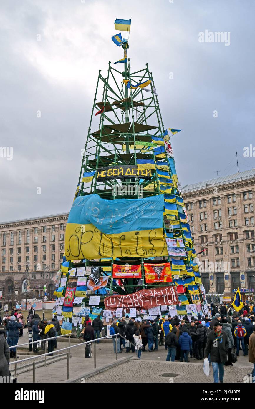 Tree construction from flags with slogans on Euro maidan meeting in Kiev.Meeting devoted to declining of Ukraine for integration to the European Union Stock Photo