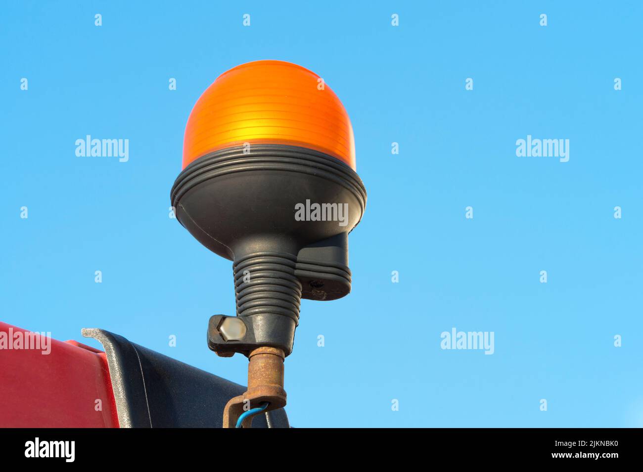 A closeup shot of a Tractor signal lamp Stock Photo