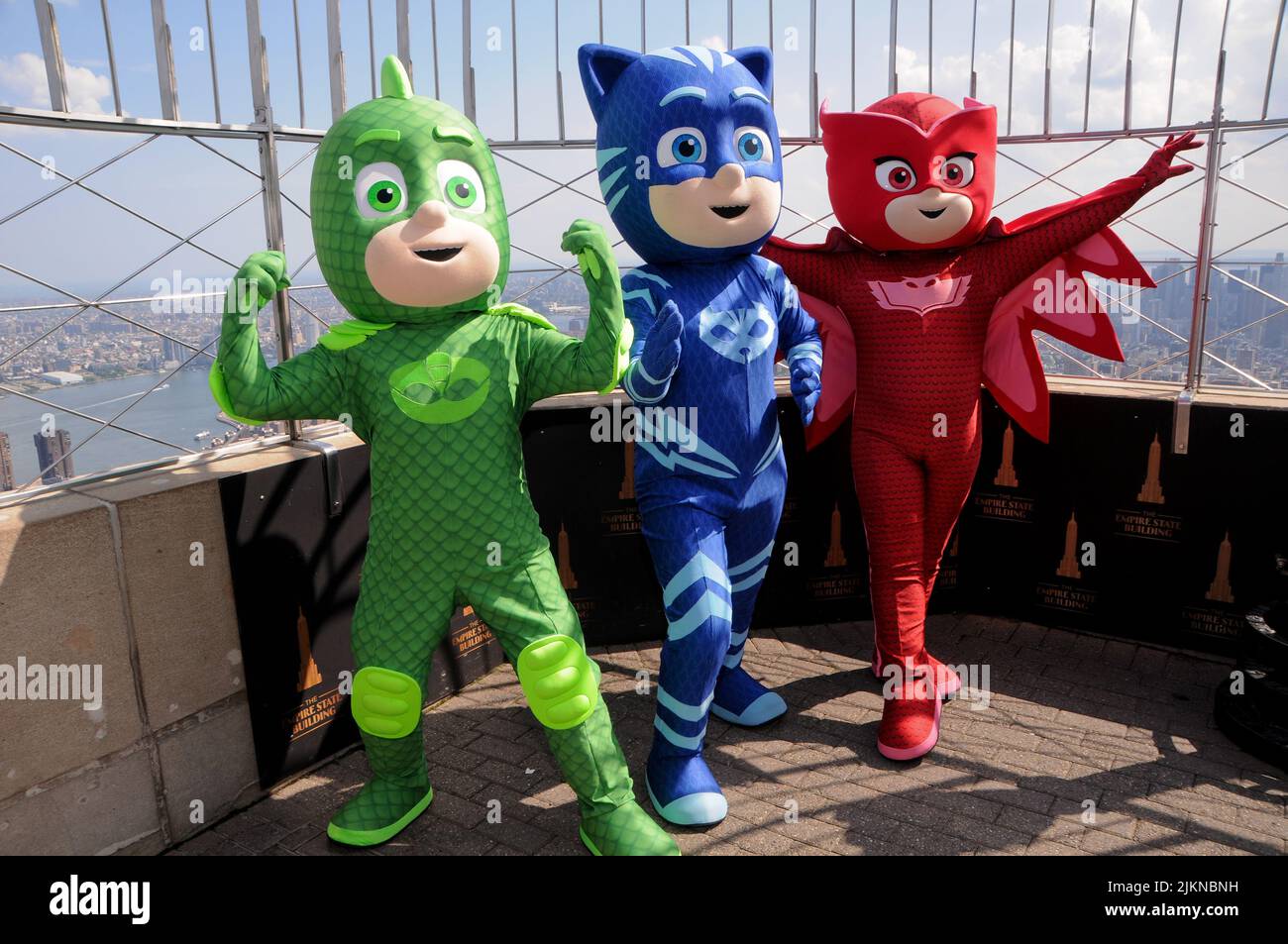 Left to Right) Gekko, Catboy and Owlette, PJ Masks heroes visit the Empire  State Building to celebrate new 'Animal Power' episodes on Disney Junior,  in New York City. (Photo by Efren Landaos /