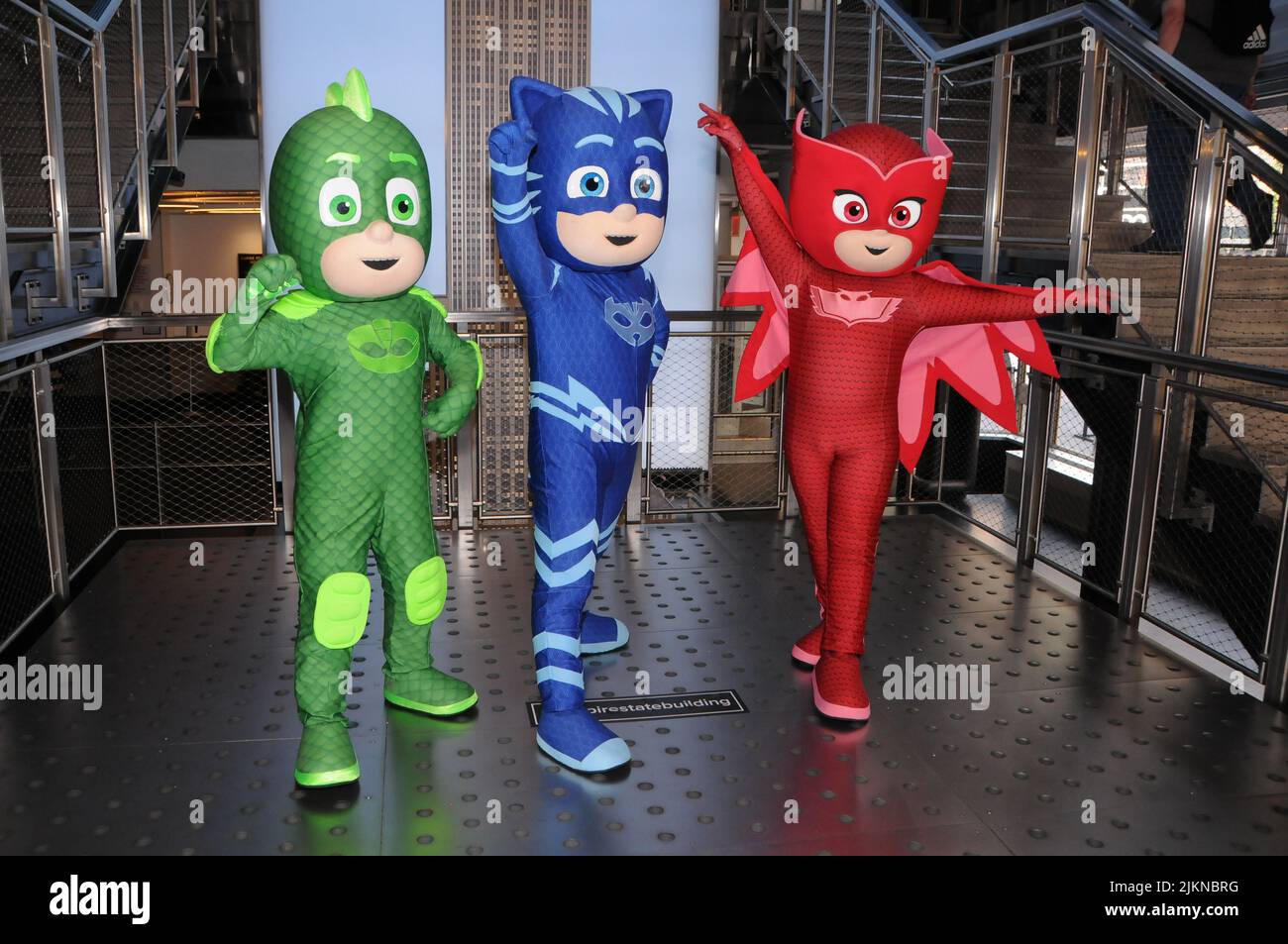 Left to Right) Gekko, Catboy and Owlette, PJ Masks heroes visit the Empire  State Building to celebrate new 'Animal Power' episodes on Disney Junior,  in New York City. (Photo by Efren Landaos /
