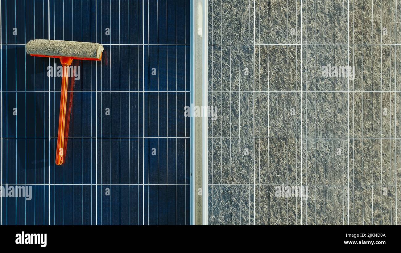 Cleaning dirty solar panels. Clean panel vs dirty panel Stock Photo Alamy
