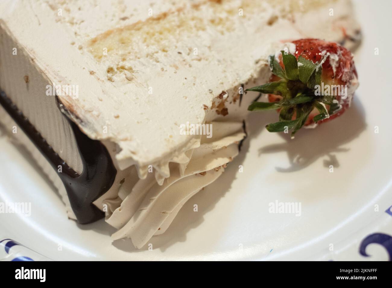 A three milk layer cake with strawberry and chocolate Stock Photo